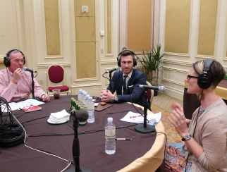 Healey Cypher (center) chatting with co-hosts Kris Stewart (right) and Bill Thorne (left).